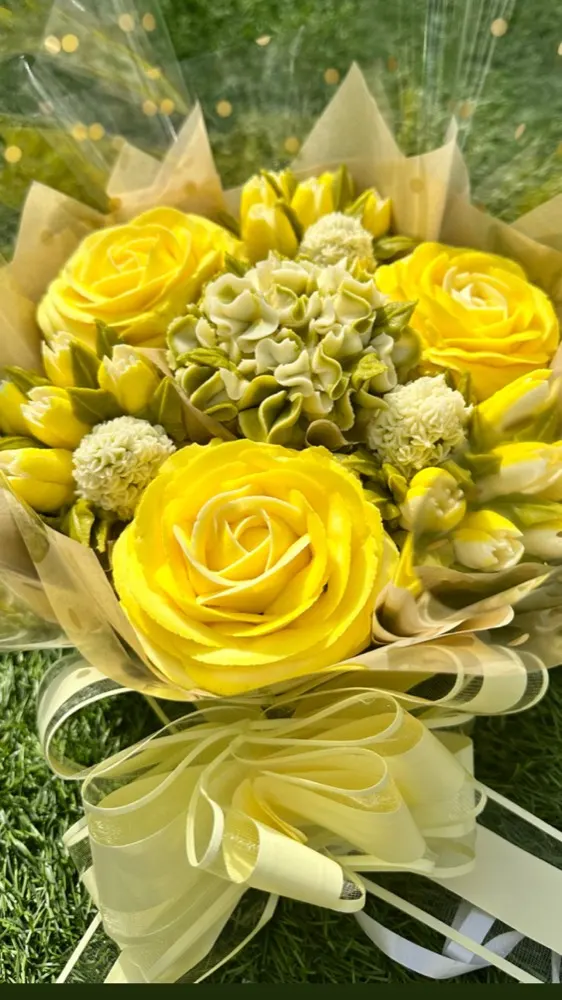 7 Deluxe cupcake bouquet with bright yellow buttercream roses and tulips